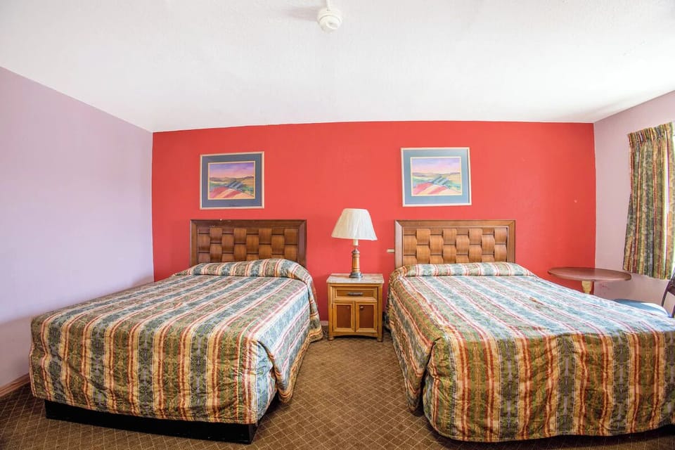 Unwind instantly in a bright room with two cozy beds.