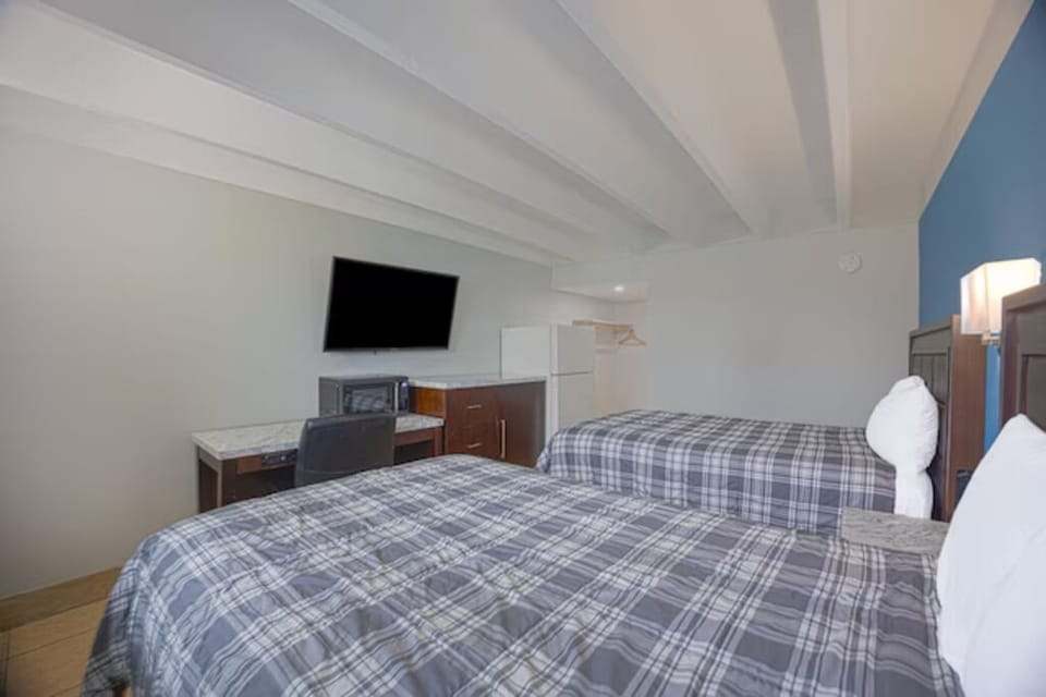 Wake refreshed with two plush beds and calming blue accents.
