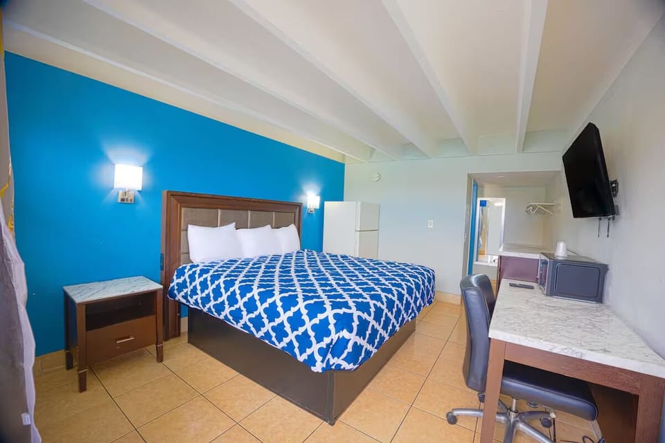 Settle into a spacious, airy room with modern comforts.