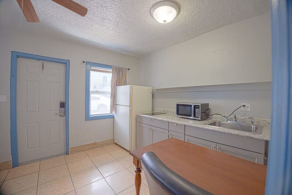 Savor easy in-room dining with fridge, sink, and counter space.