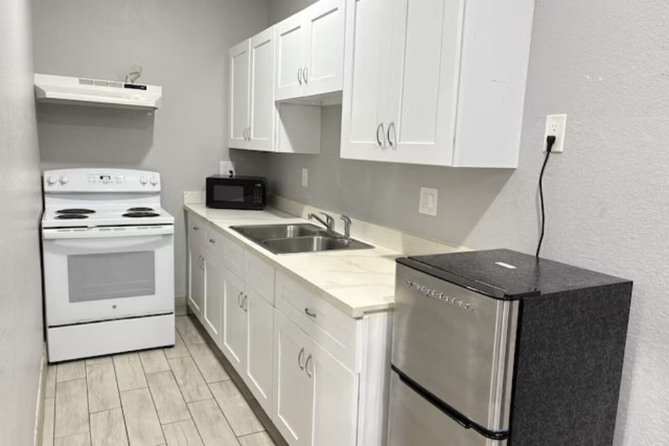 Prep quick breakfasts with generous counter space and mini fridge.