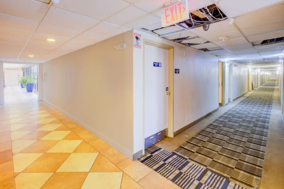 Walk through interior corridors with straightforward access to rooms.