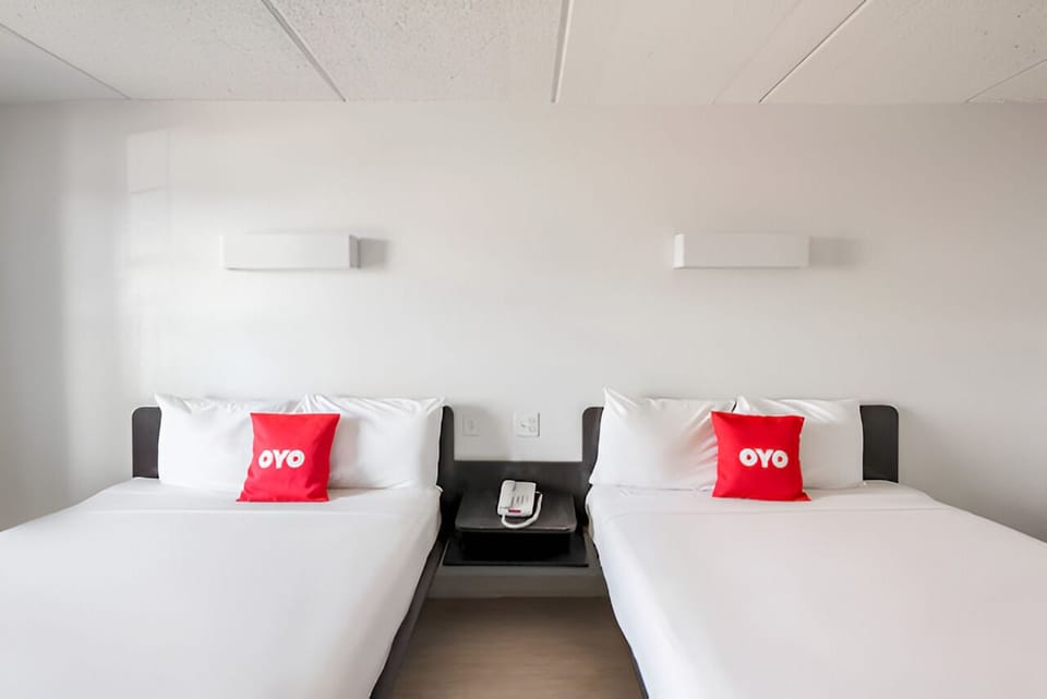 Stretch out on twin beds with crisp linens and soft pillows.