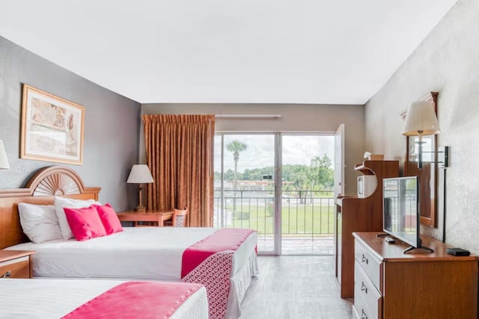 Settle in after adventures with TV, storage, and balcony doors.