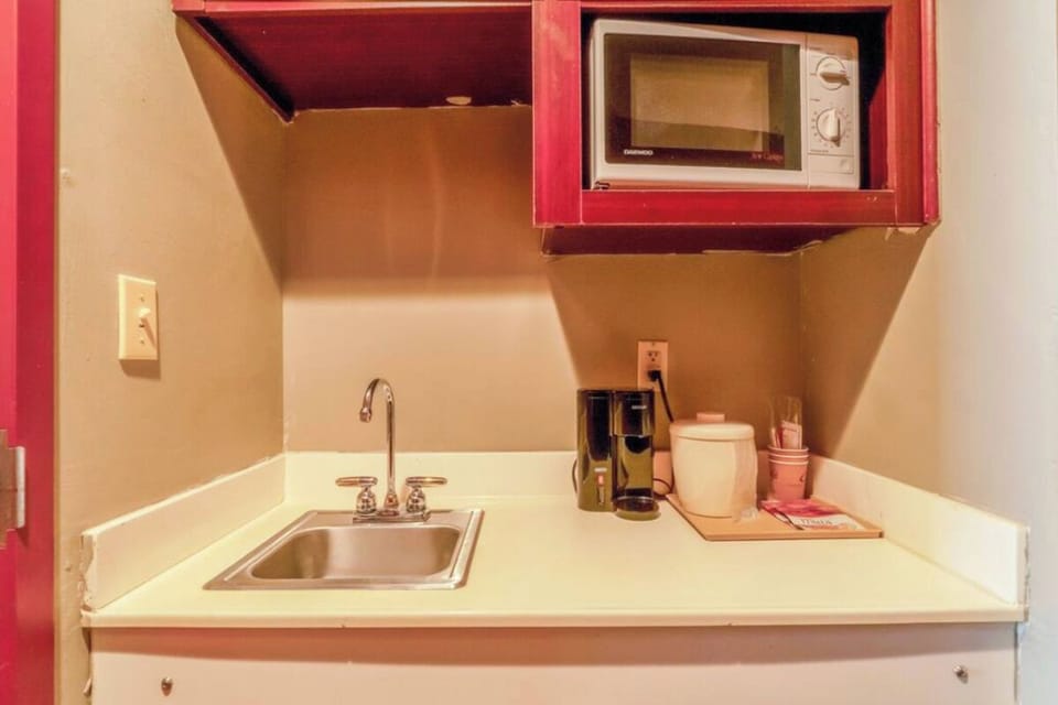 Prepare simple meals with a microwave and handy mini-sink.