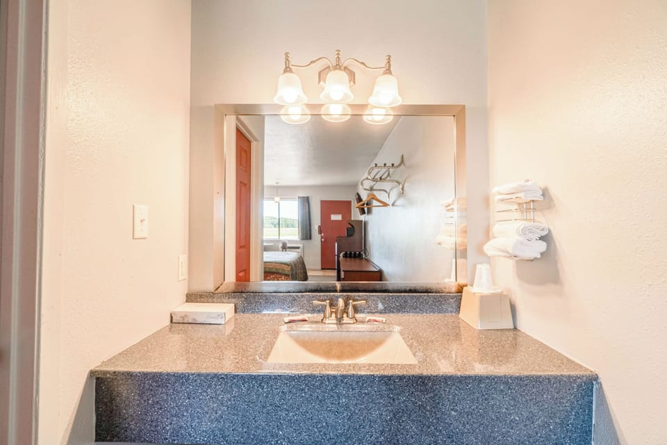 Bathroom. Interior and views may vary by availability.
