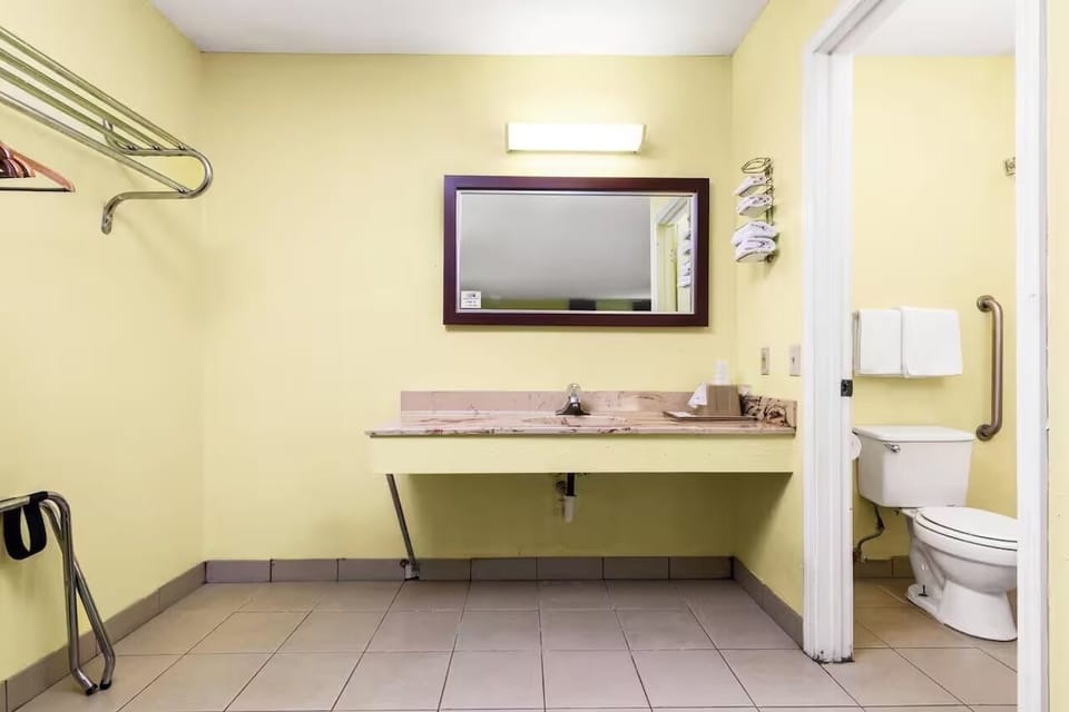 Refresh easily with a spacious vanity and bright lighting.
