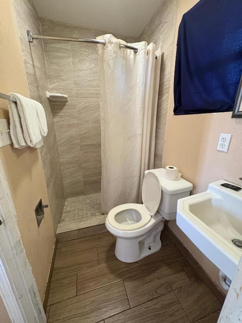 Start mornings fast with sink, shower, and fresh towels.