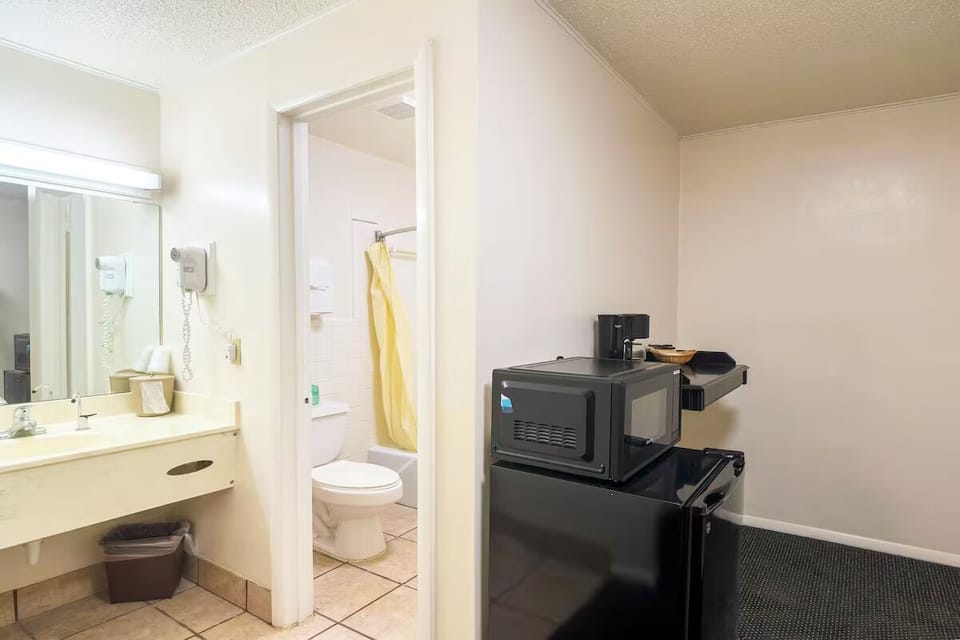 Refresh easily with a bright vanity and convenient in-room essentials.