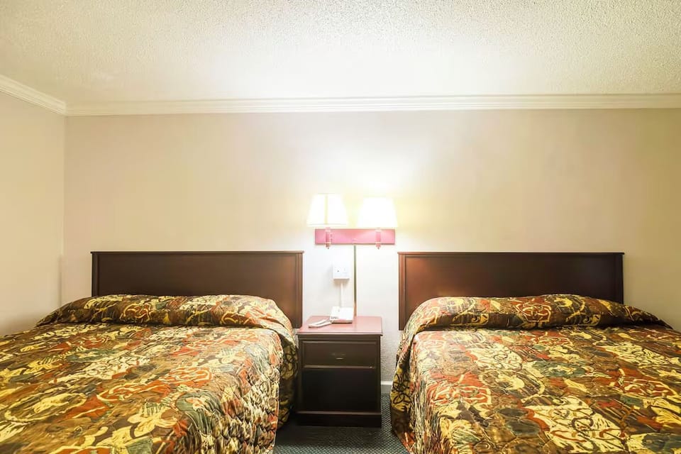 Recharge together with matching beds and soothing bedside lighting.