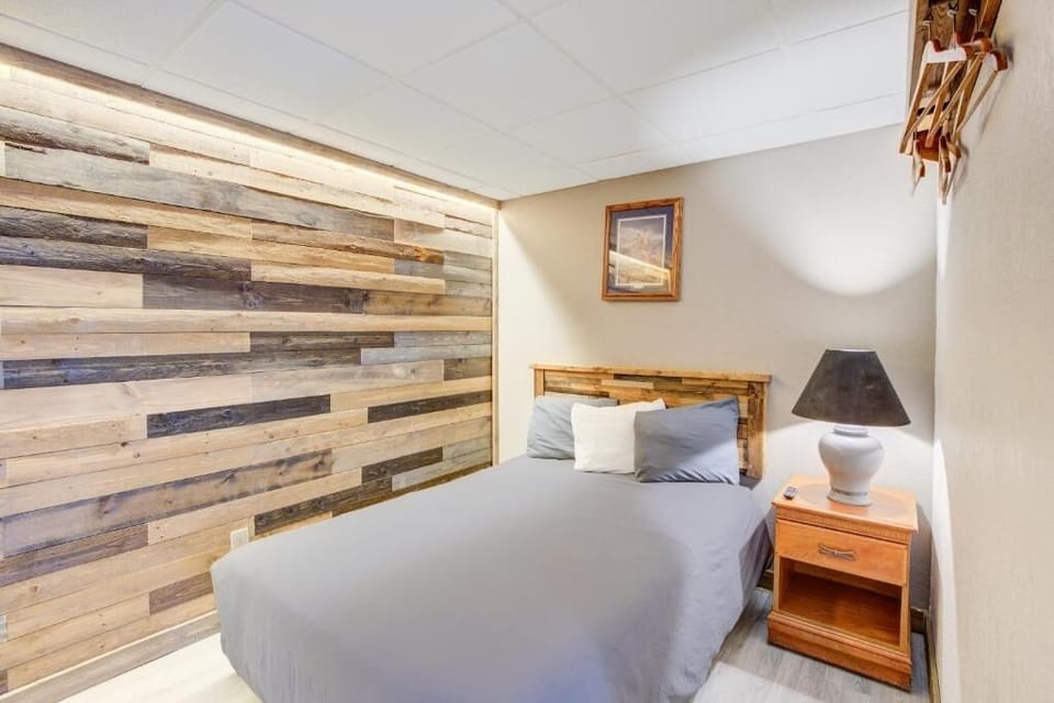 Unwind into crisp linens and a cozy, rustic retreat.