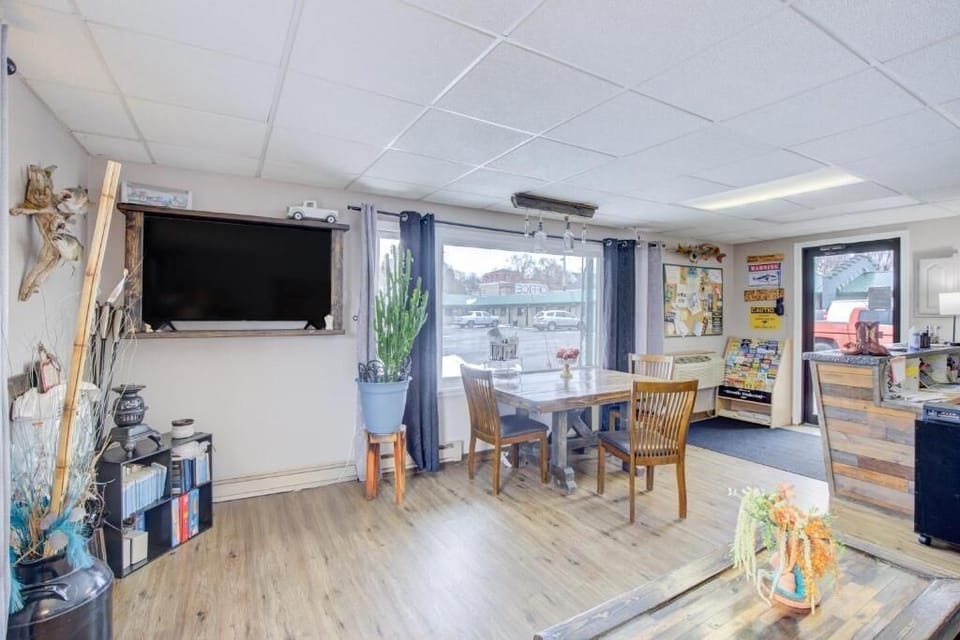 Gather for meals by bright windows and unwind with TV.