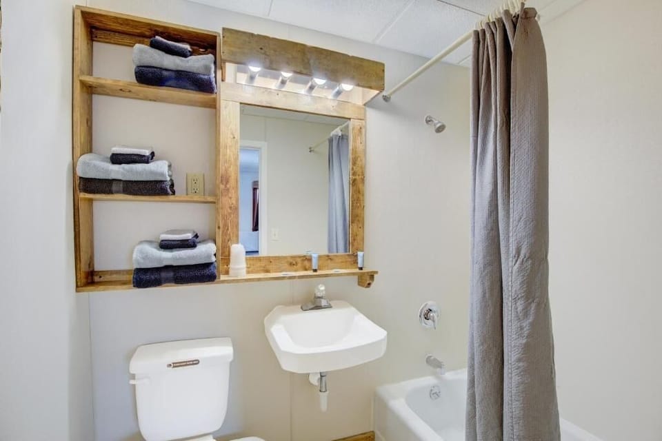 Rinse off in a simple shower-tub after a long day.