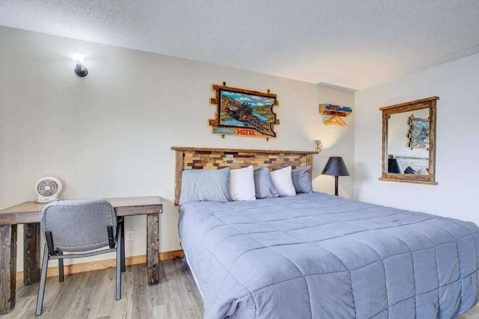 Kick back in a bright king room with handy workspace.