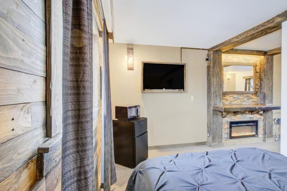 Kick back in bed and enjoy TV and easy snacks.