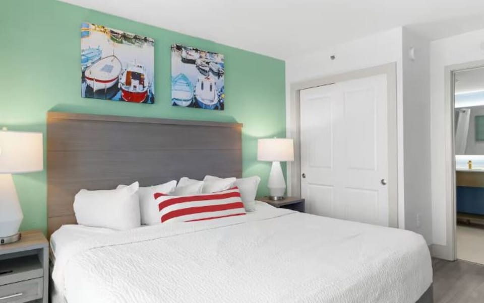 Sink into plush pillows and drift off in coastal calm.