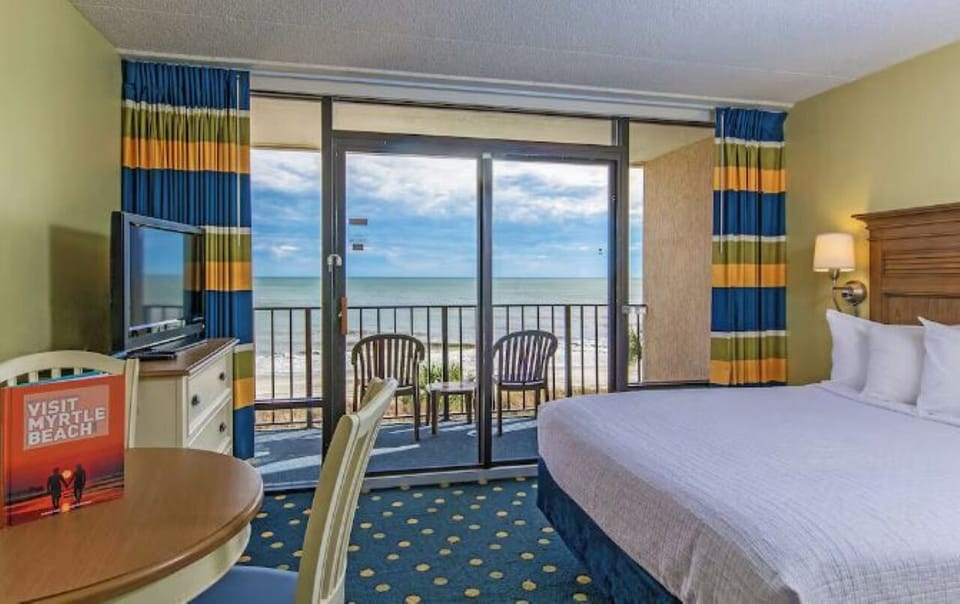 Wake up to waves and step onto your private balcony.