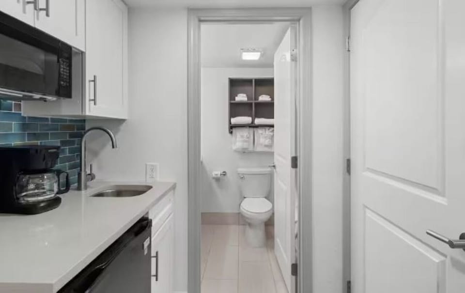 Whip up quick snacks in the sleek kitchenette, steps away.
