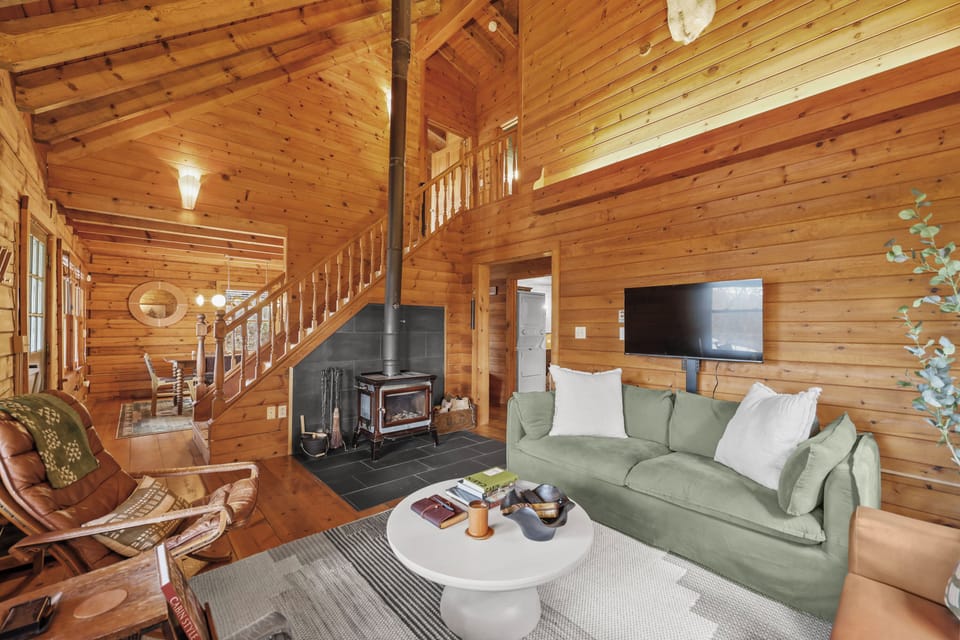 Living room looking toward dining room past the stairs 