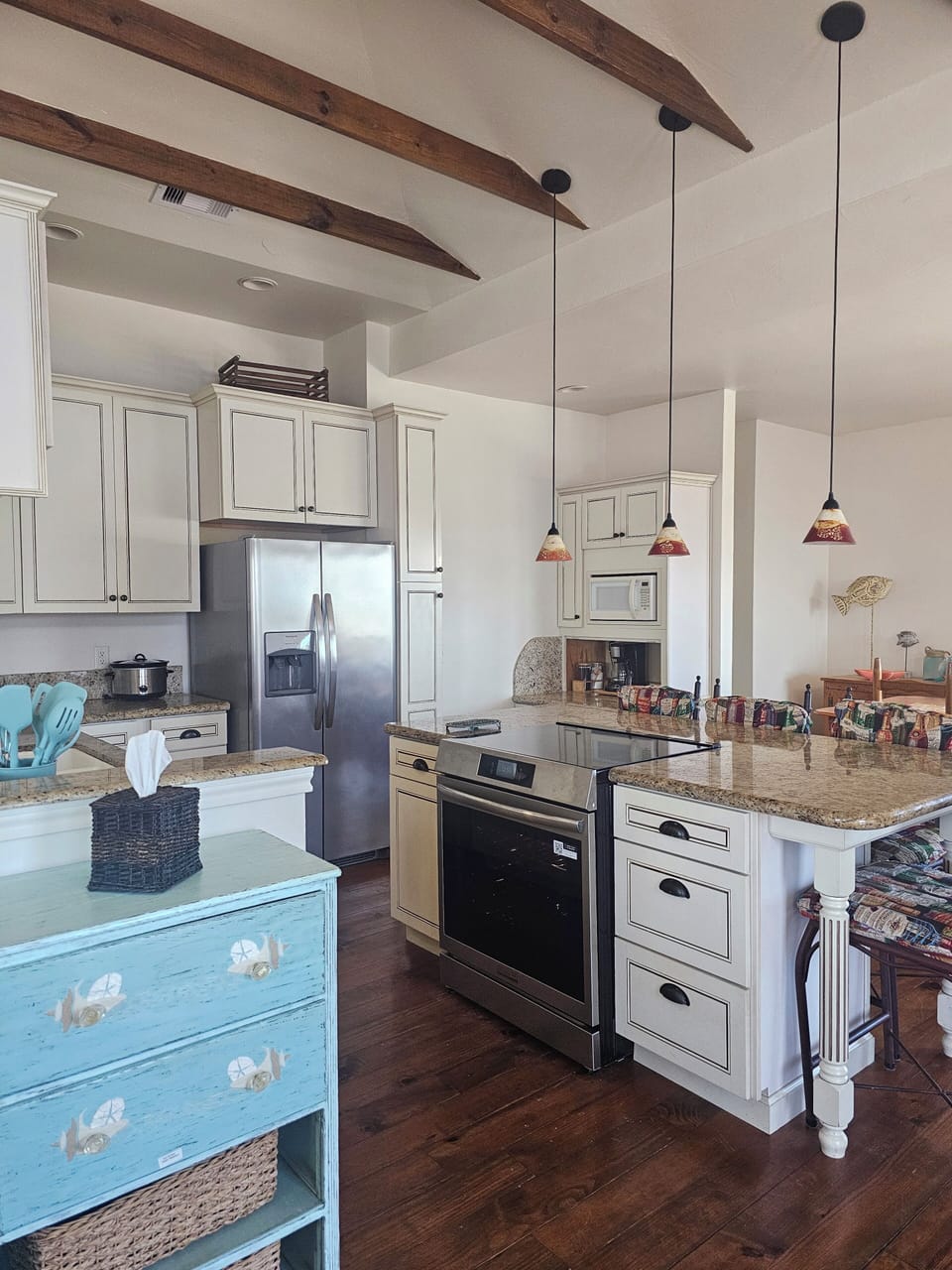 fully equipped kitchen with modern induction range 