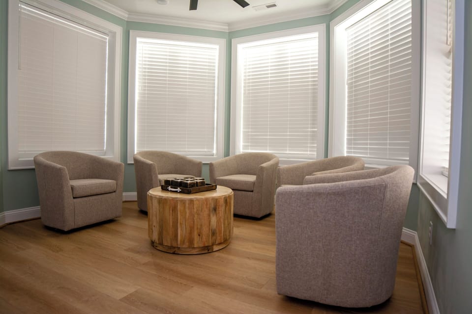 Game room with dry bar, large Smart TV, rebound shuffle table, games, and more!