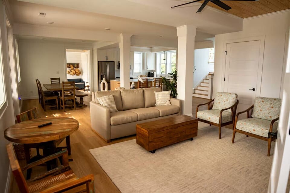 Spacious first-floor living area with a Samsung Smart TV and a sleeper sofa