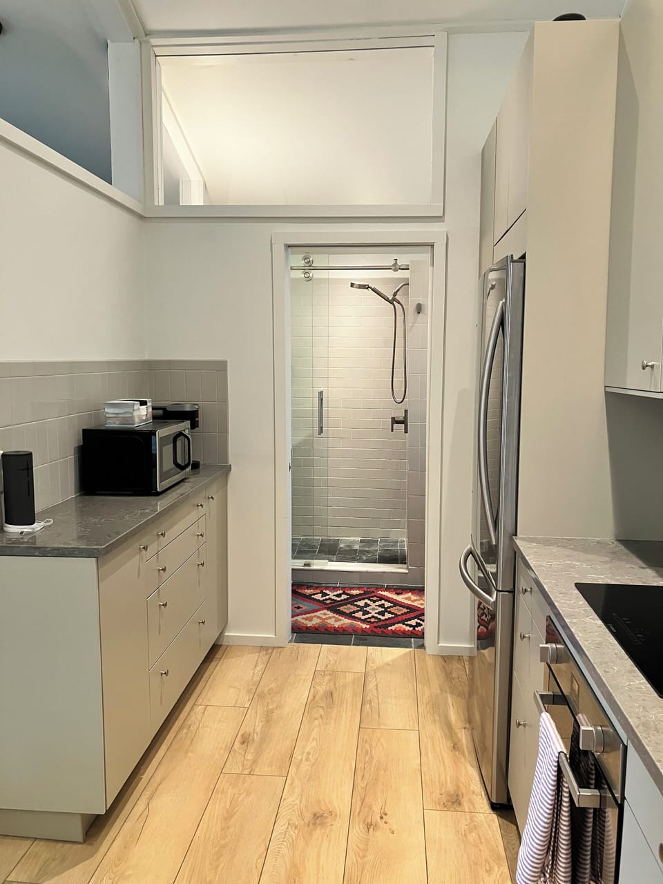 View: kitchen -upstairs bath. Rental includes Amazon "Echo", microwave, Keurig.