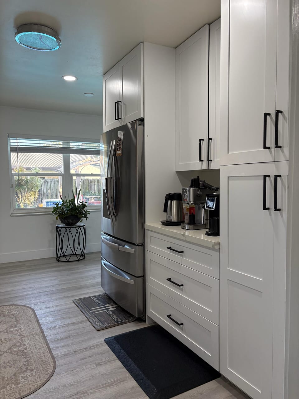 Kitchen: newly redesigned 026. overlooks backyard and pool area