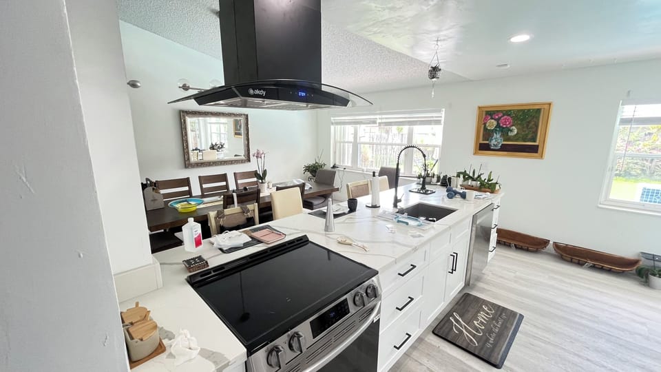 kitchen- with view to bath yard and pool area