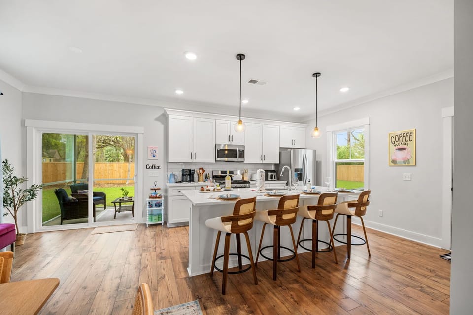 Spacious Kitchen with Access to the Private Backyard & Screened In Patio and Access to the Garage