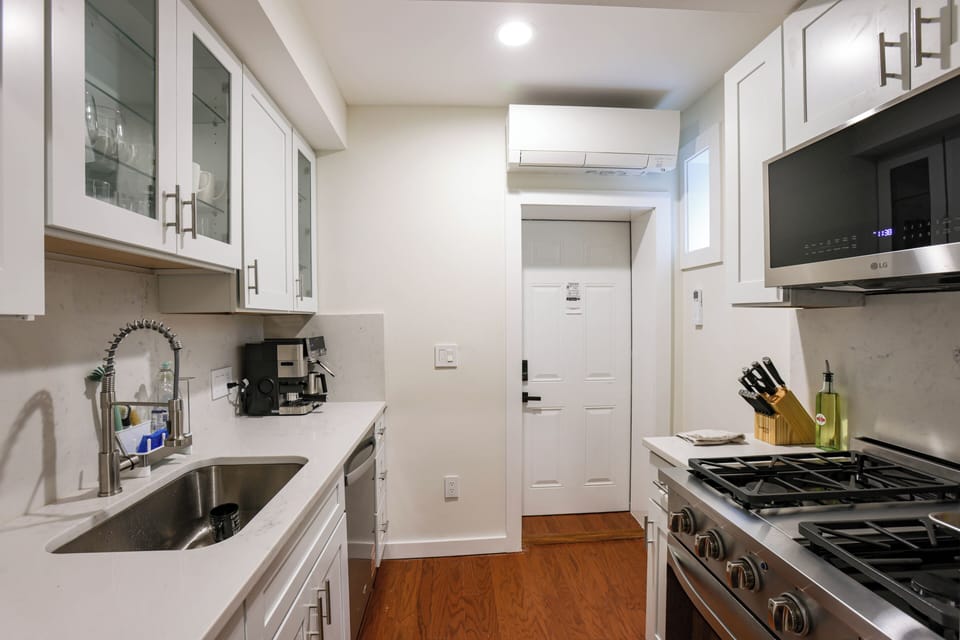 Fully equipped modern kitchen ideal for home cooking, group stays, and comfortable extended stays at Dupont circle near Washington DC
