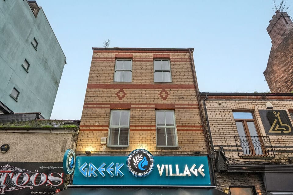 Street-facing exterior view of the building façade in the surrounding area