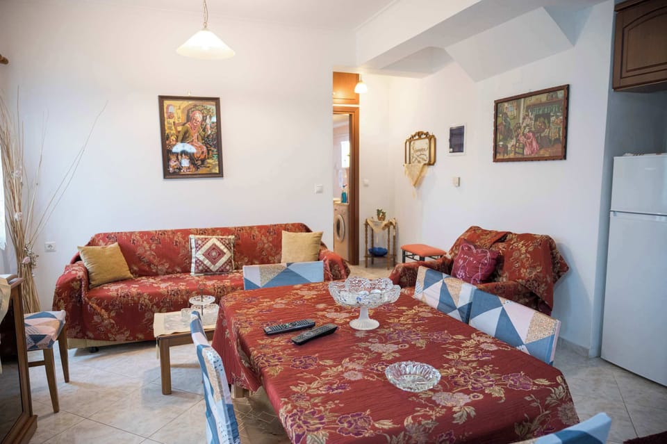 Warm and comfortable living area with traditional Lesvian decor.