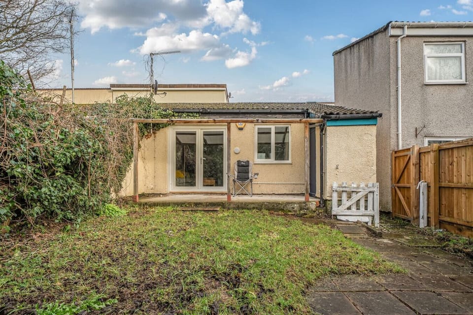 Enjoy the garden outlook from the rear patio doors and lawn