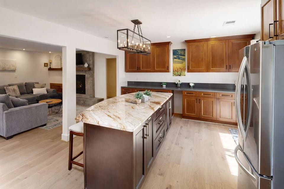 Bright dining room with large windows and elegant seating—perfect for enjoying meals with family and friends. 🍽️