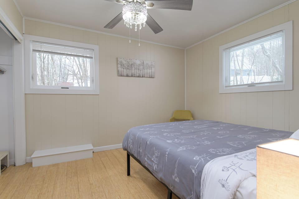 2nd floor bedroom with a queen bed—comfortable, bright, and ready for your stay.