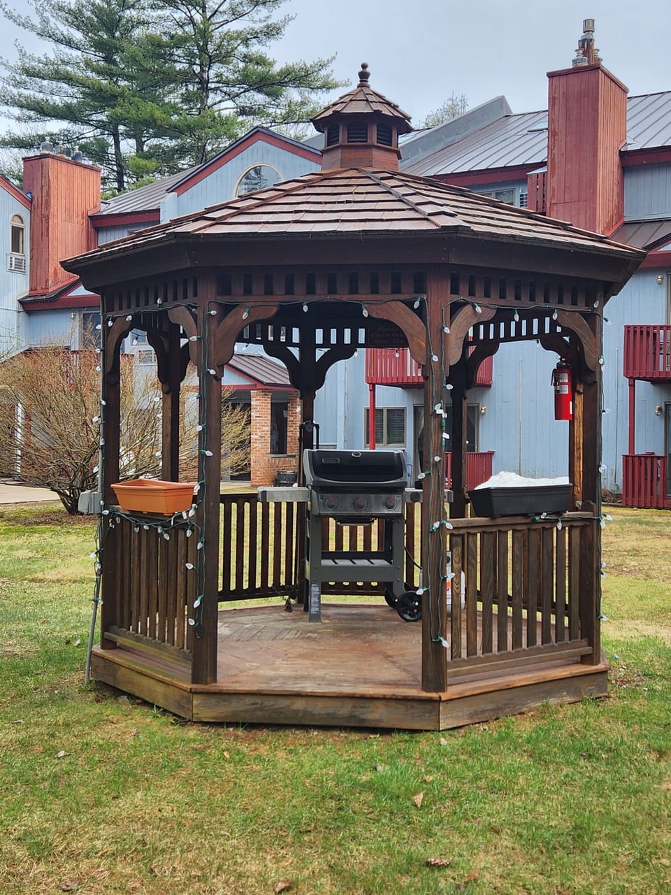 The community grill is located in this gazebo right next to our building.