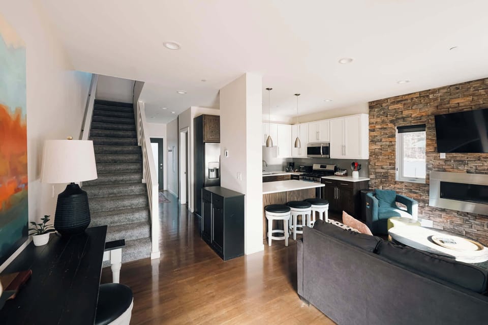 Entry view with living area & kitchen