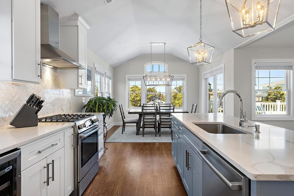 High end kitchen with quartz counters.