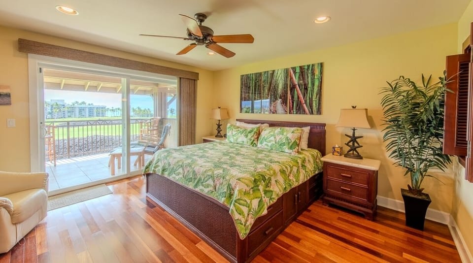Wake up to breezy mornings with balcony views from bed.