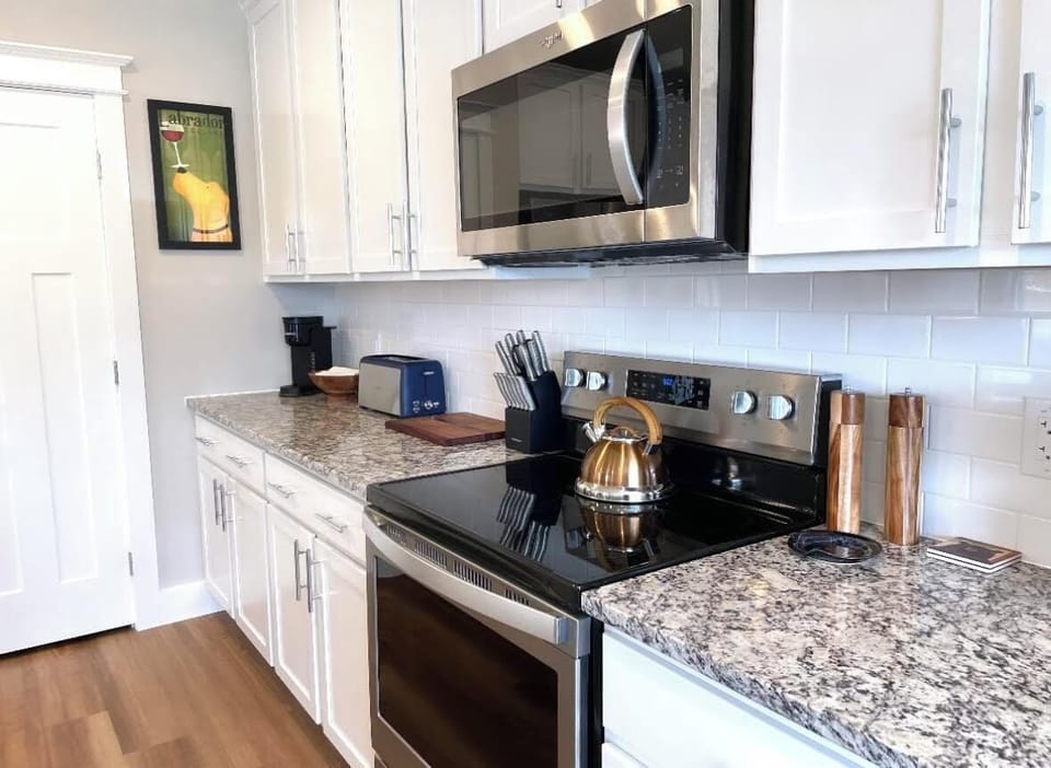 Kitchen is complete with Keurig coffee maker, toaster, and tea kettle.