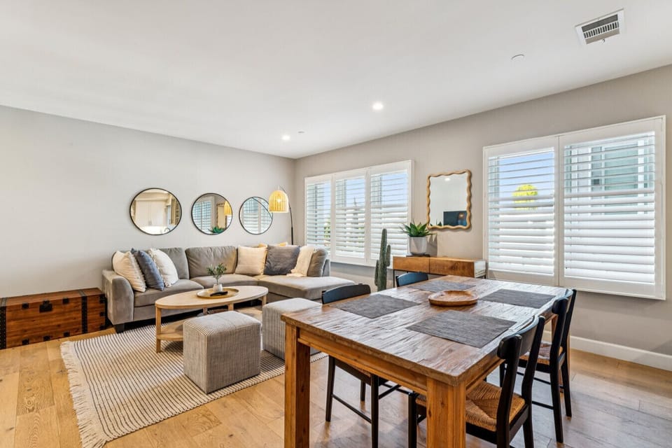 Open living & dining area filled w/ natural light and comfortable seating for easy gatherings
