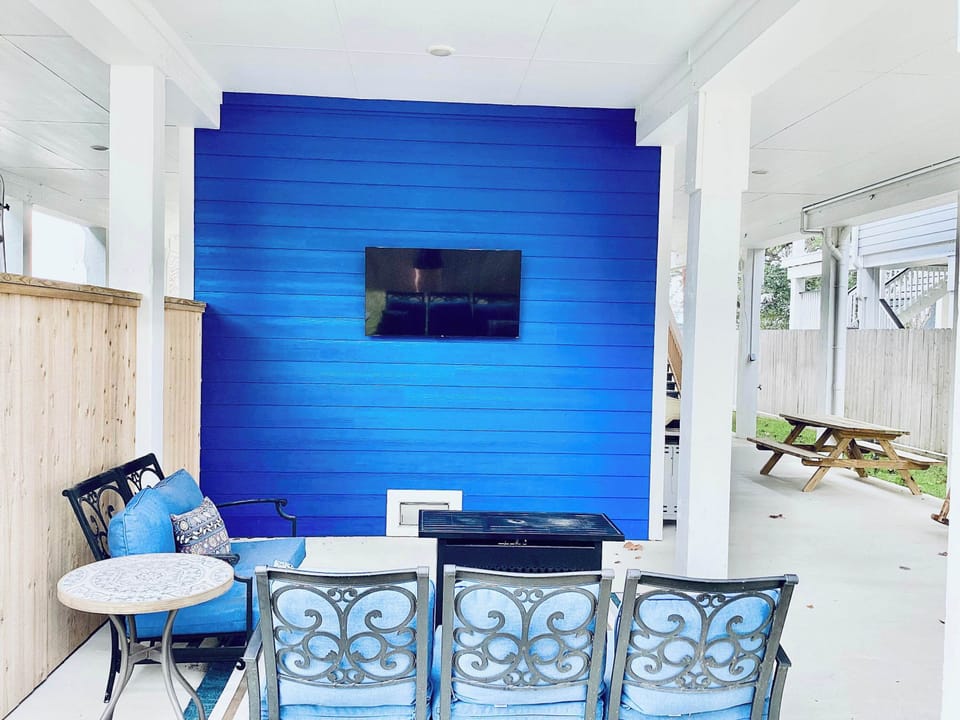 Watch, relax, and enjoy the outdoors on the downstairs patio