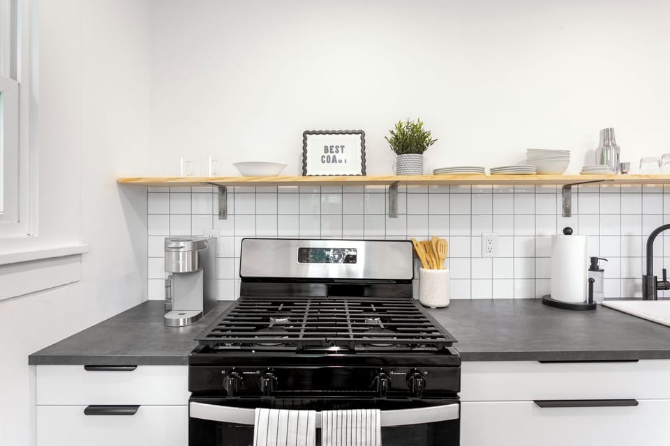 Modern kitchen with gas range and everything you need to cook.