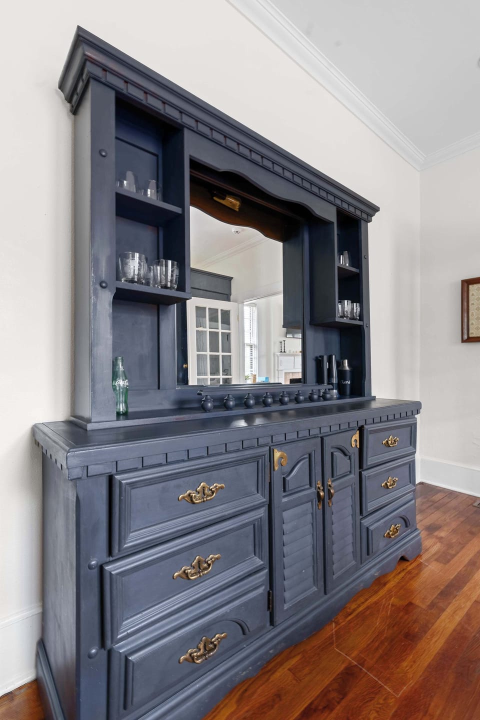 Designer Dining Room with Statement Built-In Cabinetry
