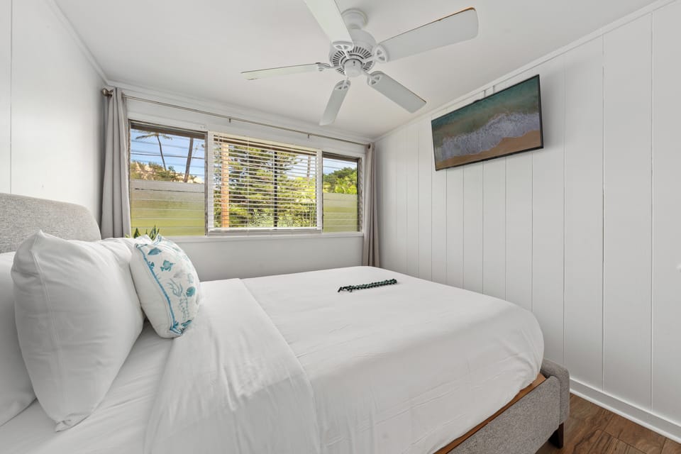 Catch a breeze or a movie — this light-filled room is perfect for winding down in style