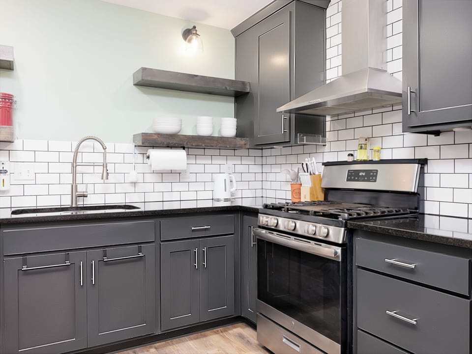 Fully equipped kitchen featuring a gas range, stainless appliances, and abundant prep space. Whether you're cooking breakfast or a full family dinner, everything you need is within reach.