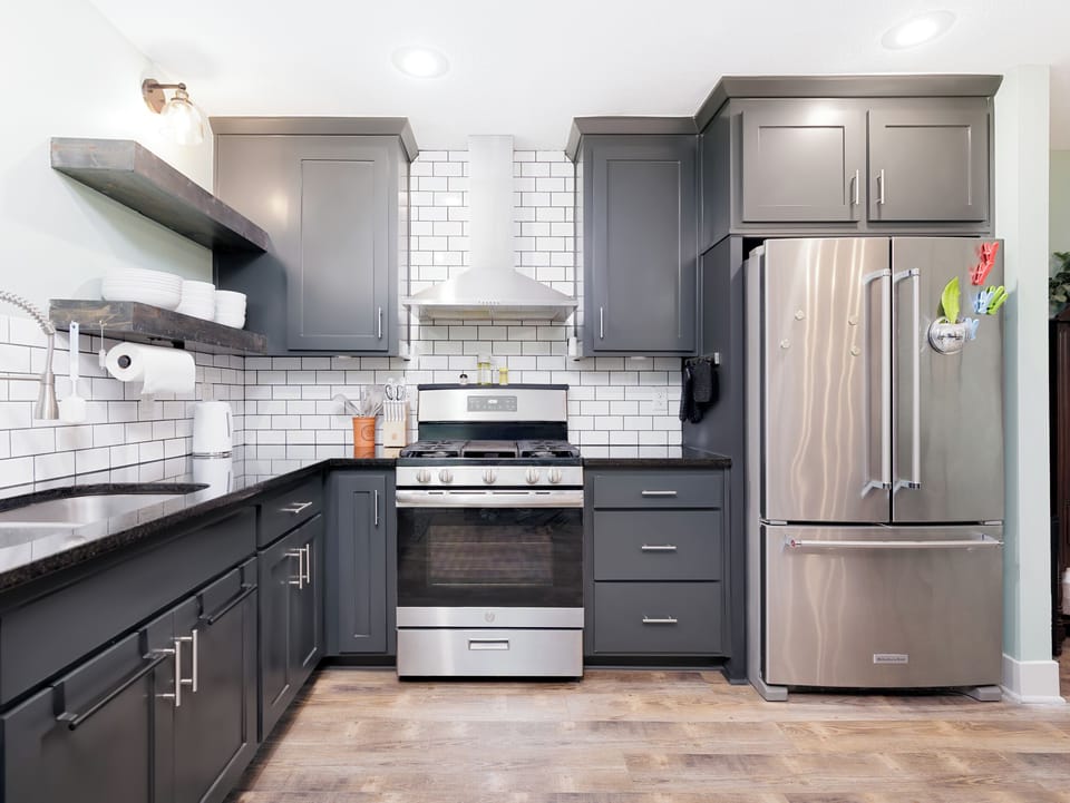 Well-designed kitchen with stainless steel appliances, generous counter space, and modern finishes throughout. Fully equipped with cookware, dishes, and essentials for everyday meals or extended stays.