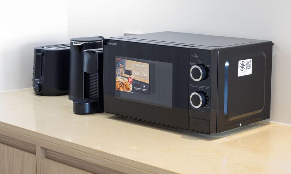 In-room microwave and coffee station for added guest convenience.