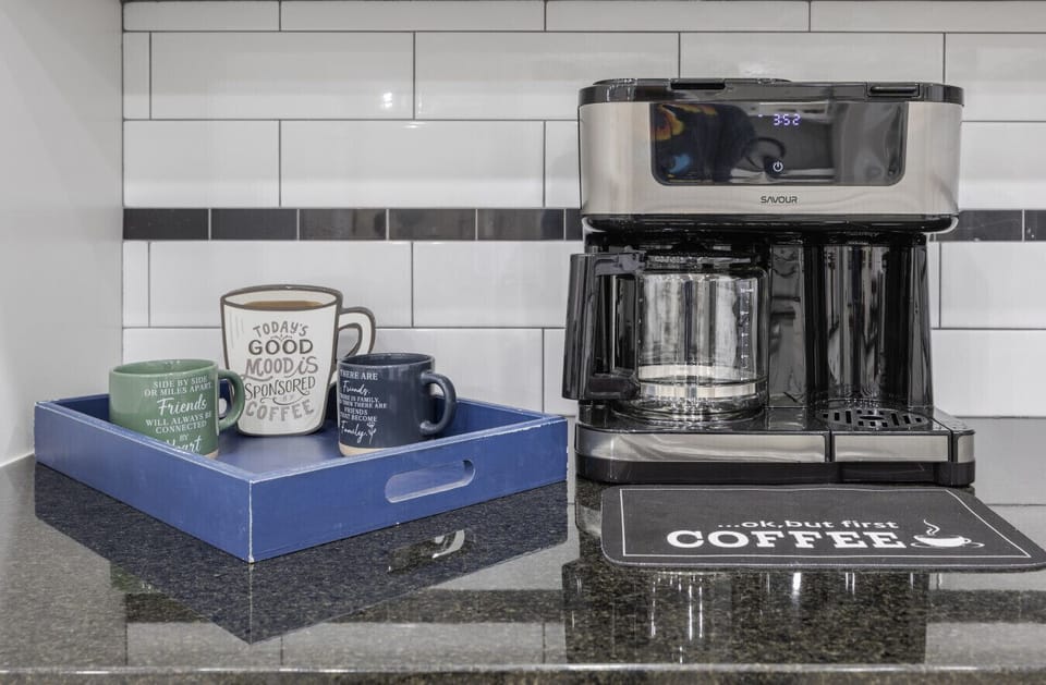 Coffee area, coffee, creamer, and sugar provided